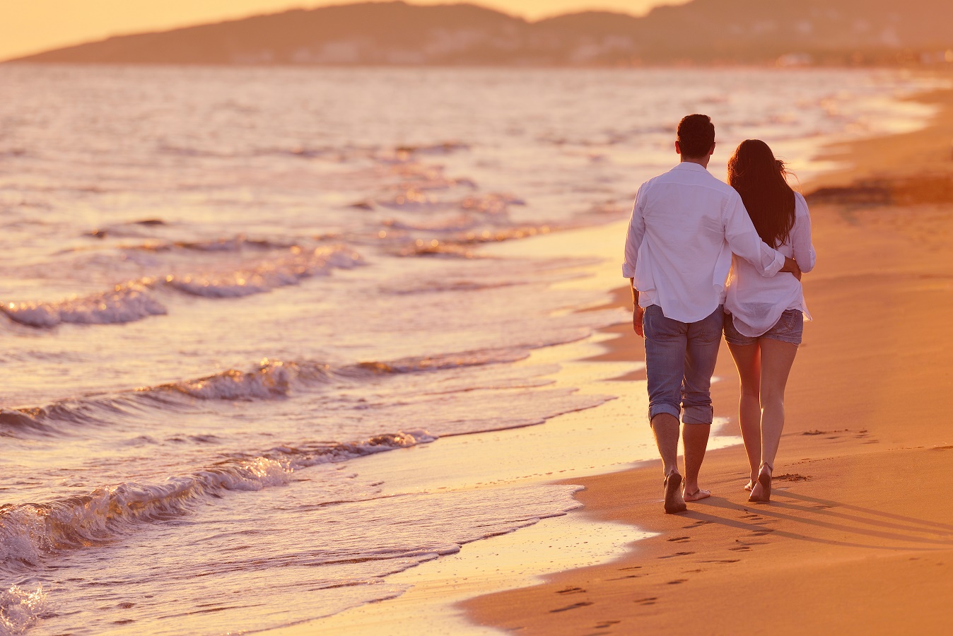 young couple  on beach have fun