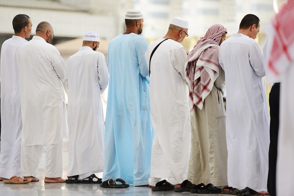 Muslims praying together at Holy mosque